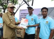 Pj Bupati Tangerang Serahkan Bantuan Kapal dan Alat Tangkap Ikan ke Empat KUB Nelayan