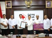 Peduli Bencana Sumatera, Pemkab Tangerang Salurkan Bantuan Rp1,5 Miliar Melalui PMI Pusat